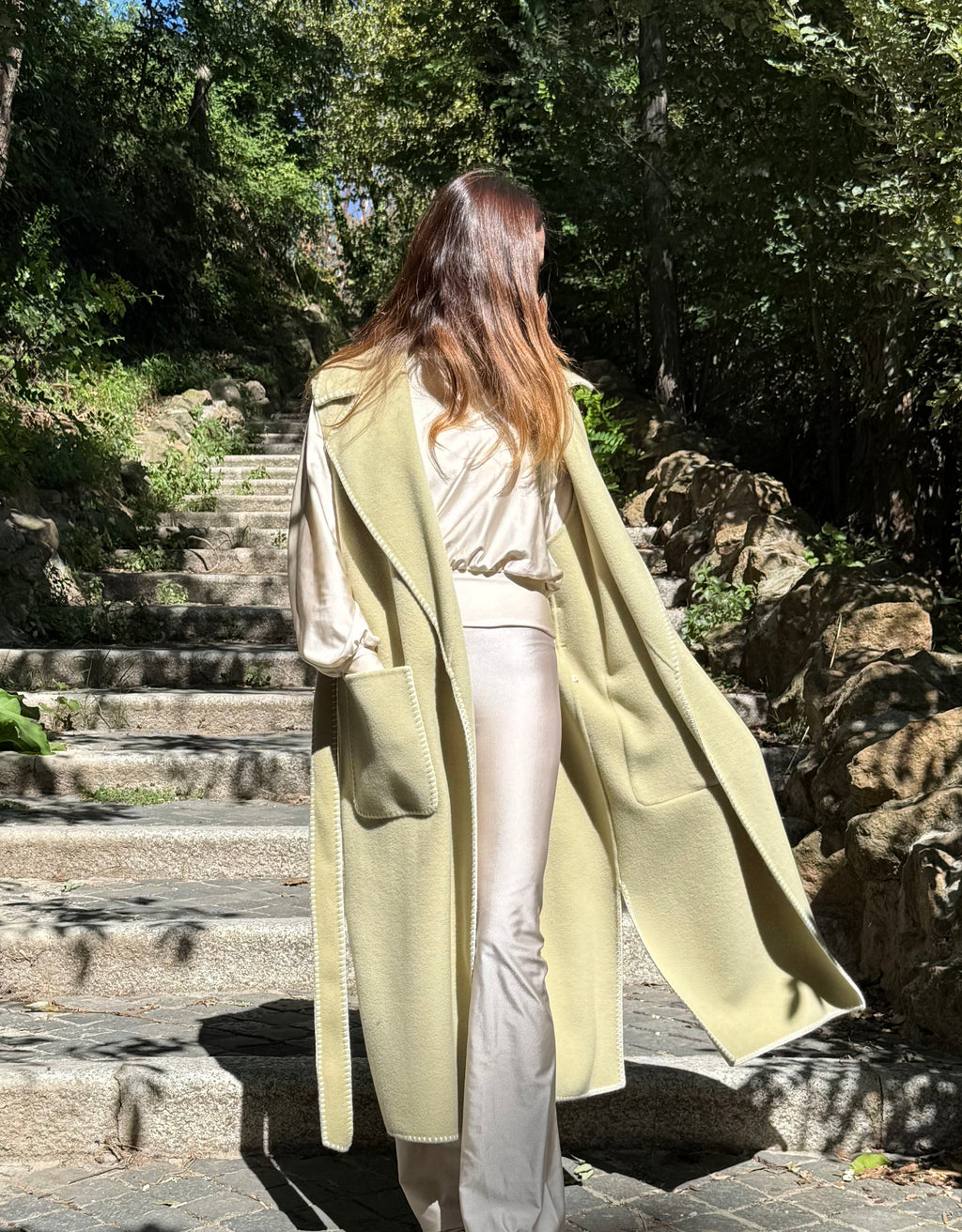 Tailored sleeveless light green wool coat limited edition