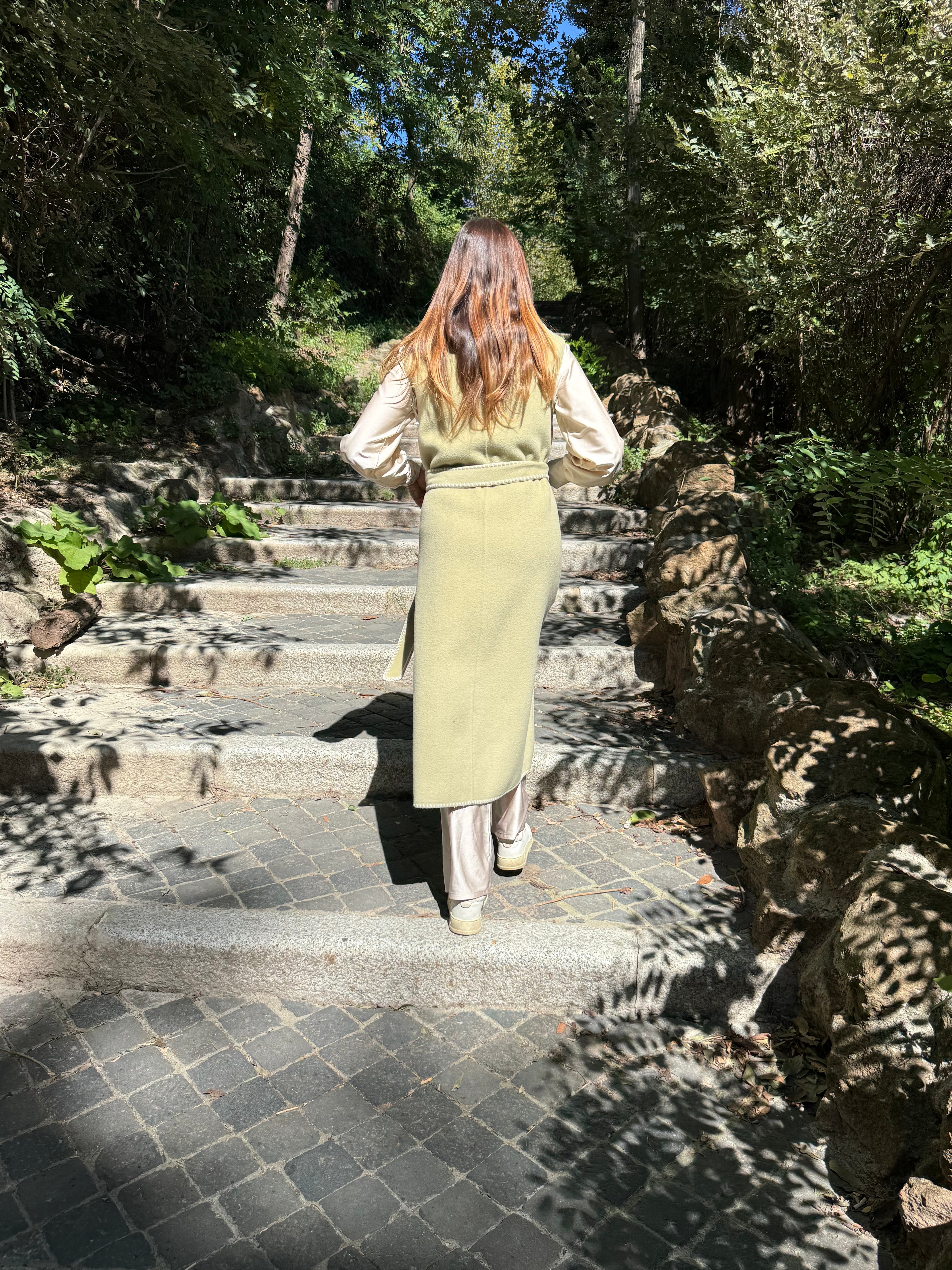 Tailored sleeveless light green wool coat limited edition