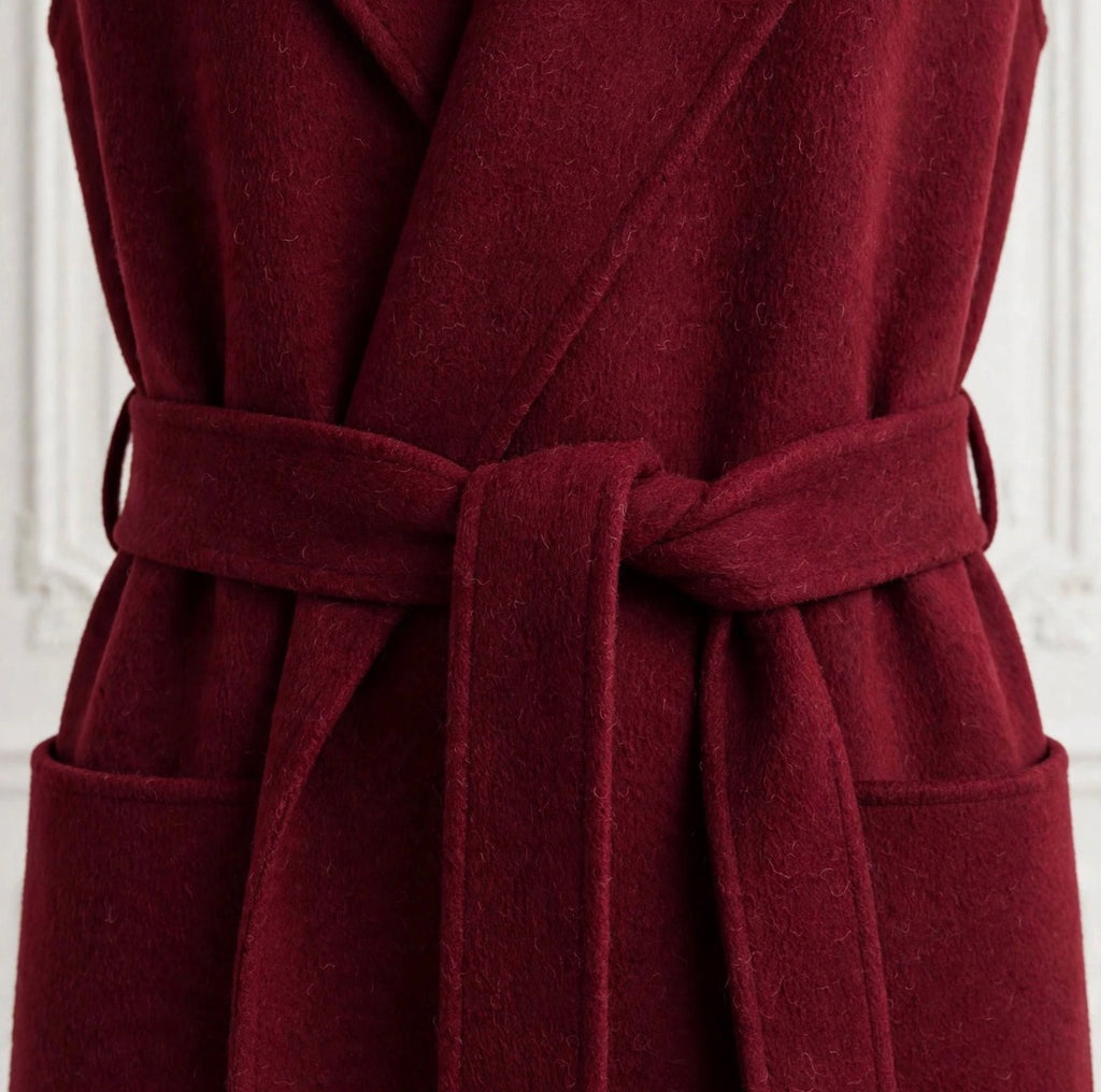 Burgundy sleeveless wrap coat with belt